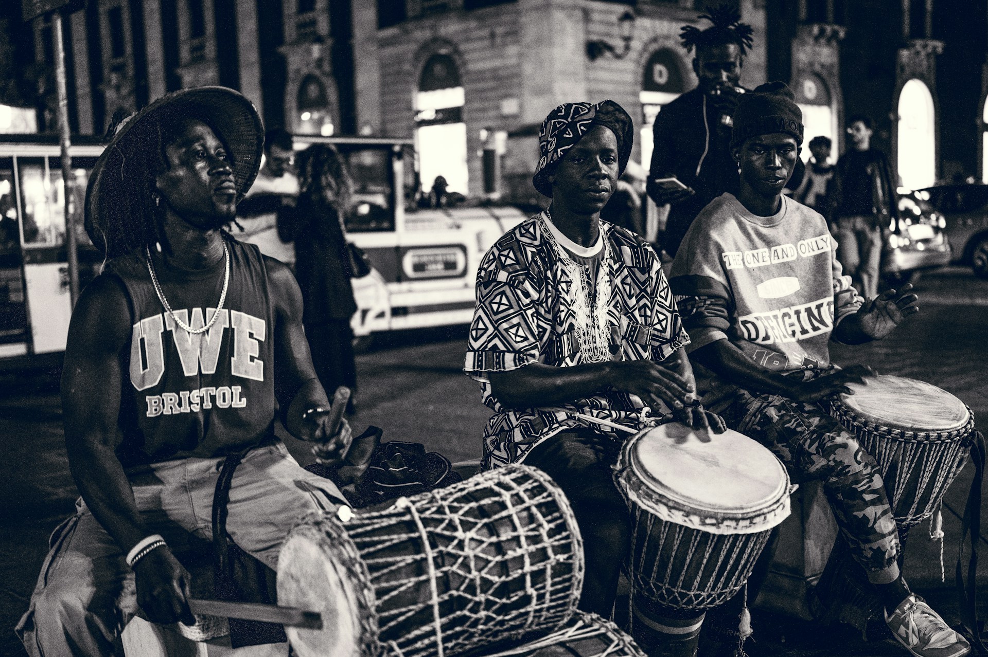 Afro-Latin percussion — hands on djembé, congas in studio